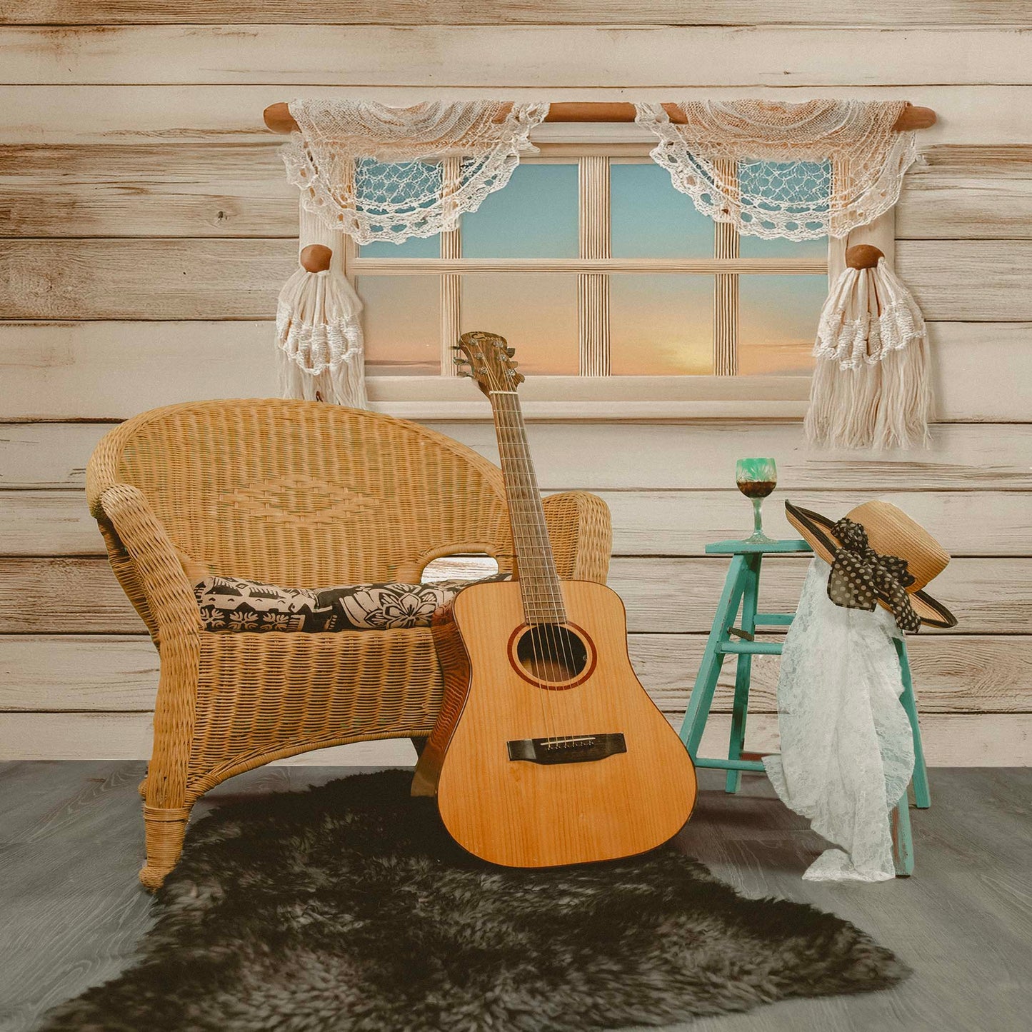 Boho Inspired Still Life with Acoustic Guitar, Wicker Chair, and Straw Hat