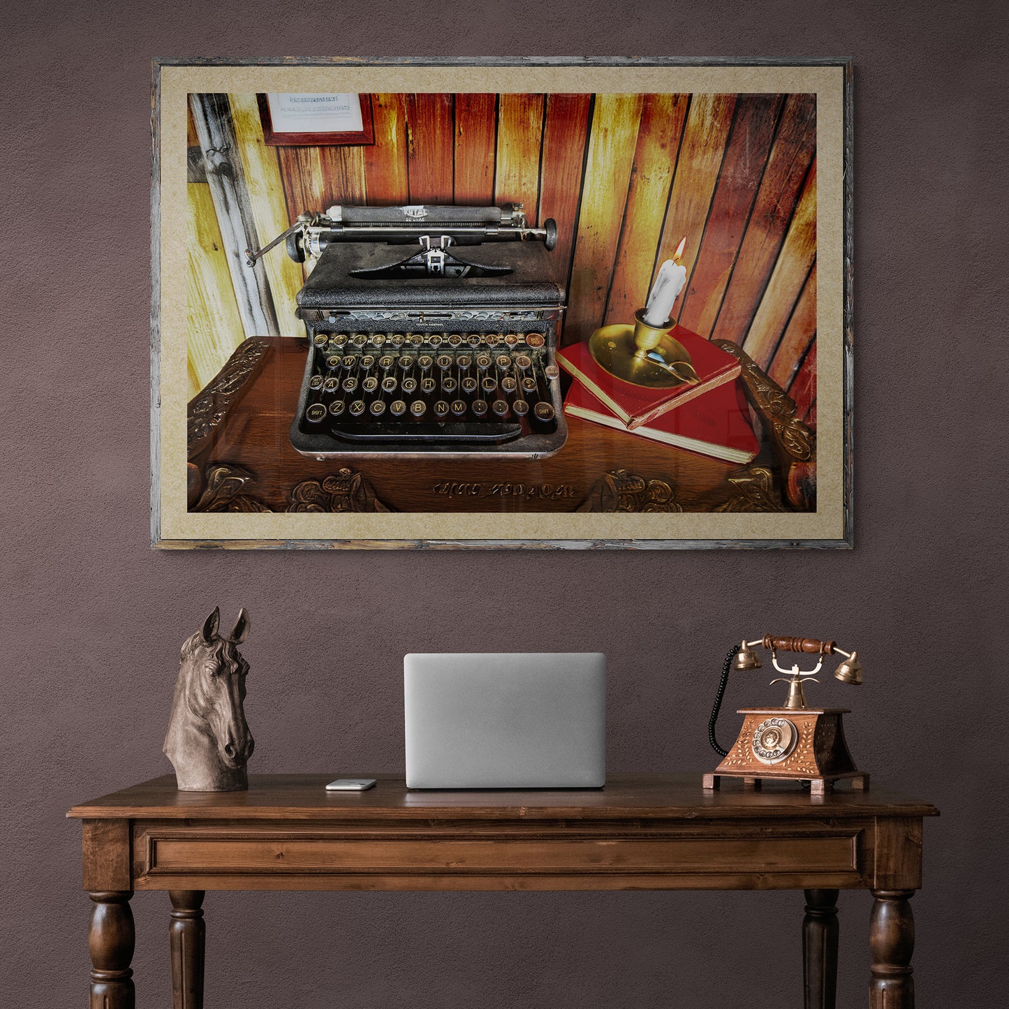 Vintage Royal Typewriter on a Desk with Vintage Books by Candlelight